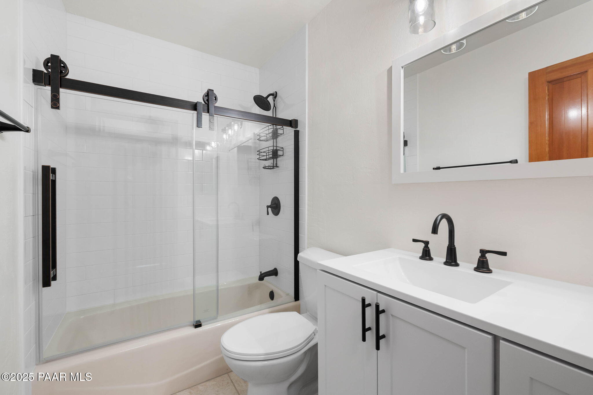 1219 Timber Point North Prescott, AZ 86303 - Photo 20 of 38 a bathroom with a sink toilet and shower