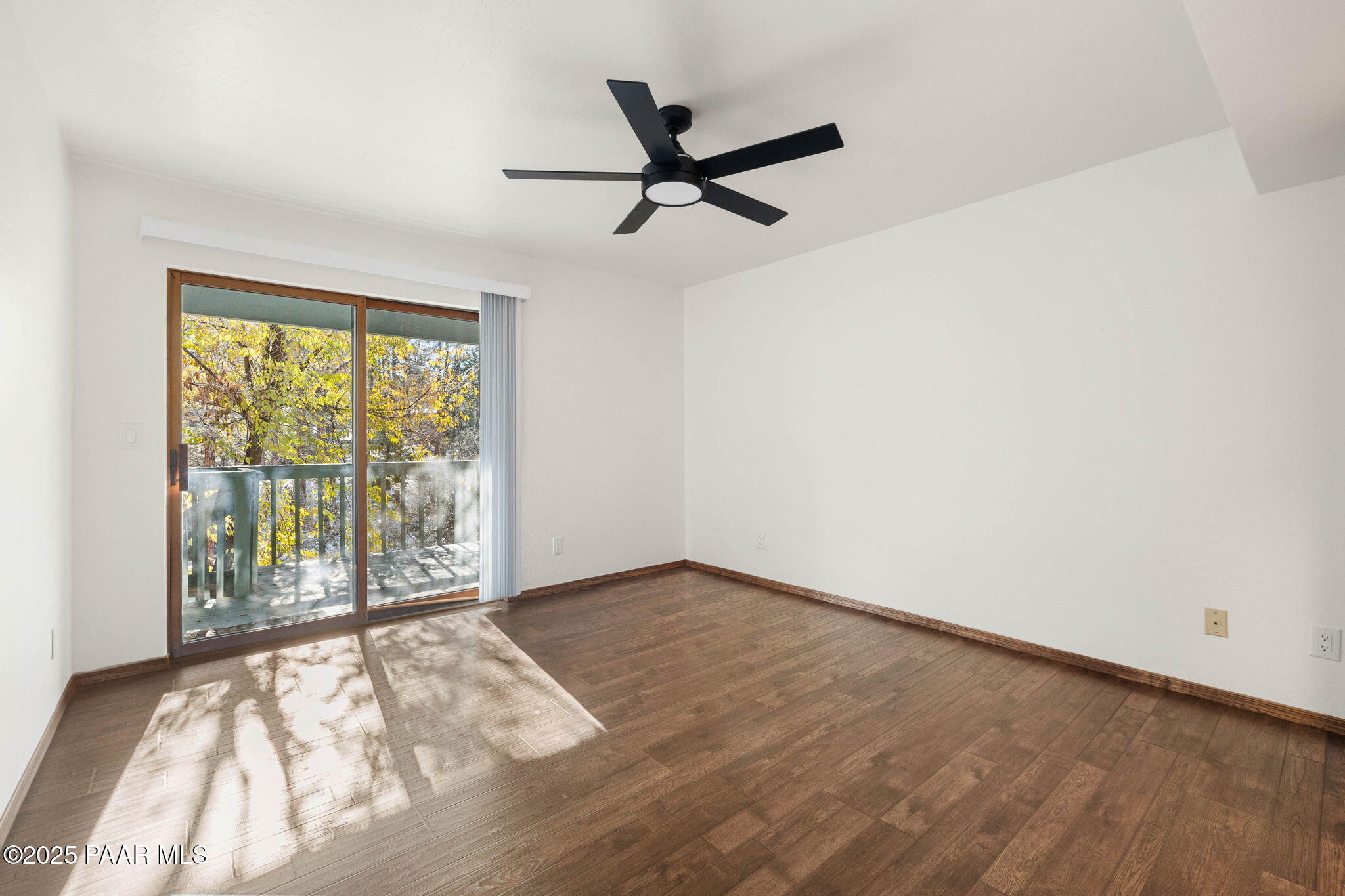 1219 Timber Point North Prescott, AZ 86303 - Photo 21 of 38 wooden floor in an empty room with a window