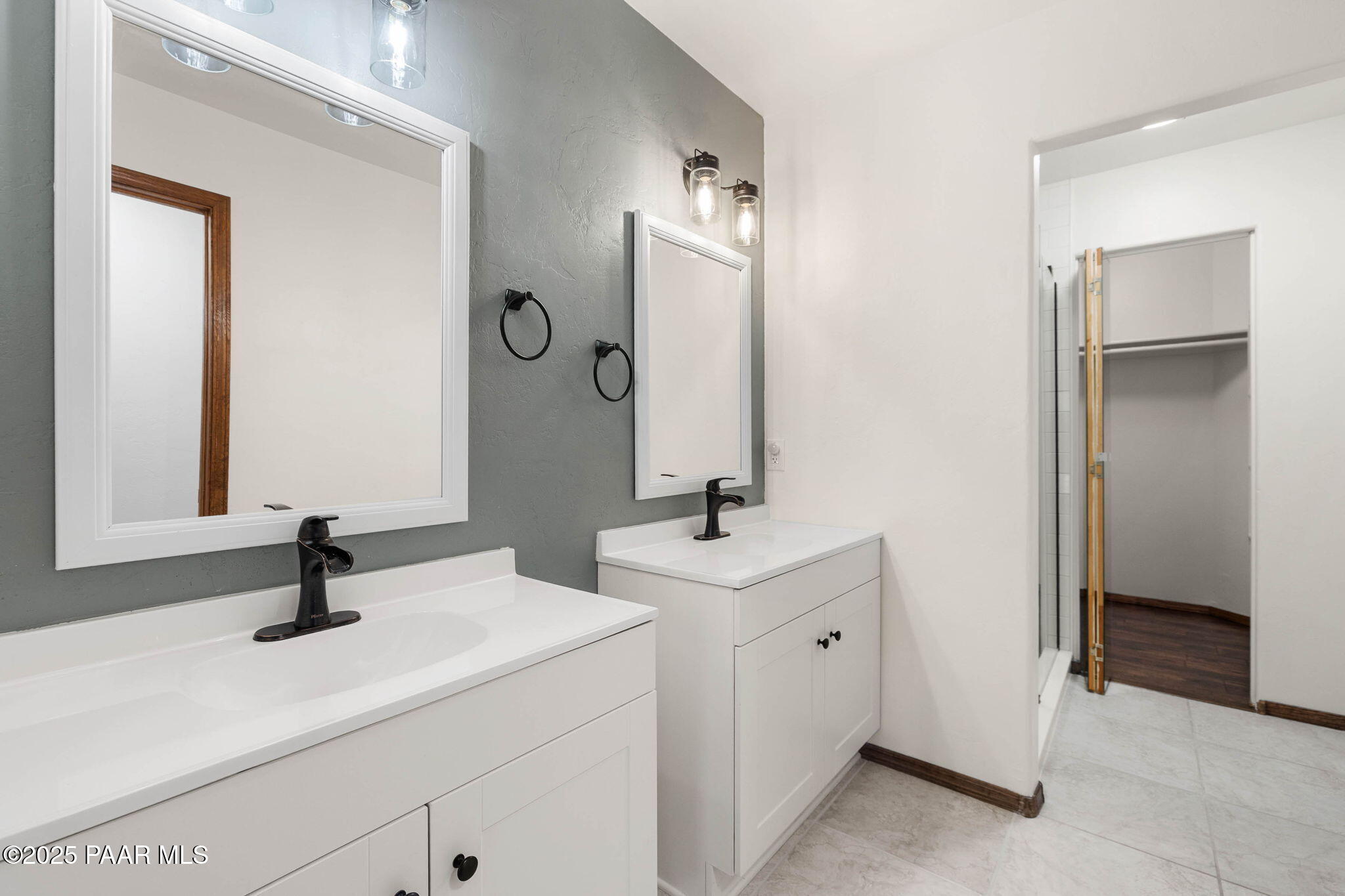 1219 Timber Point North Prescott, AZ 86303 - Photo 23 of 38 a bathroom with a sink and a mirror