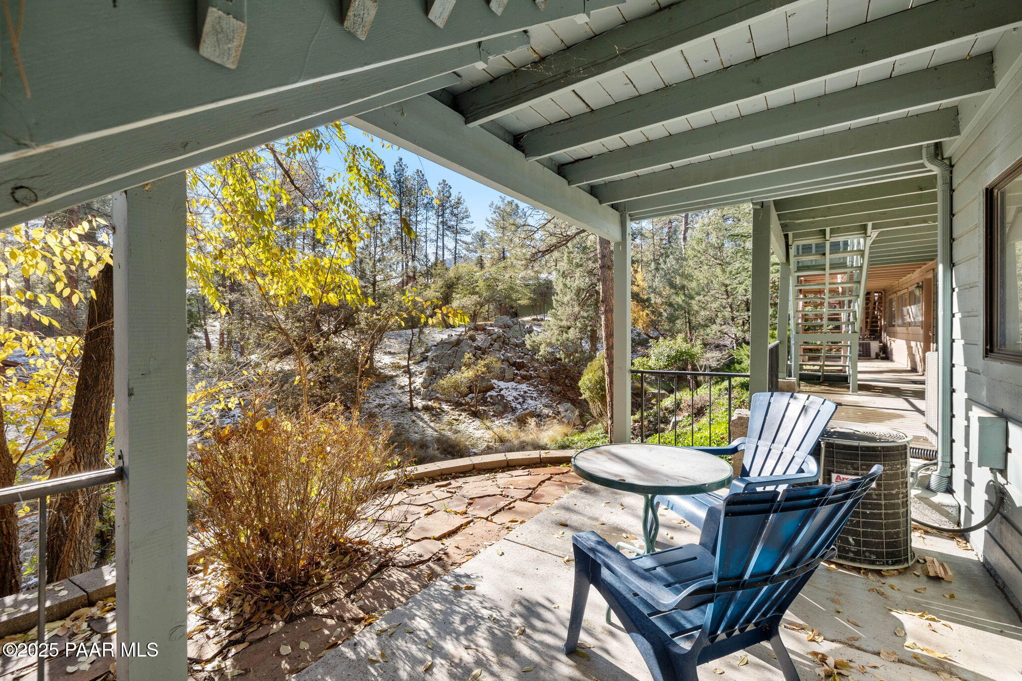 1219 Timber Point North Prescott, AZ 86303 - Photo 30 of 38 a living room with a couch and a table