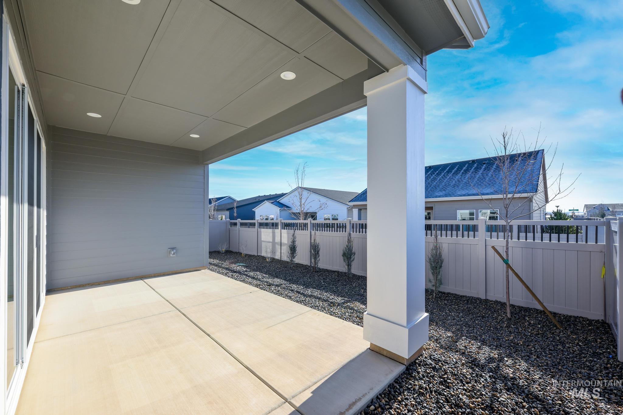 8629 West Stillmore Street Star, ID 83669 - Photo 25 of 27 Fenced backyard with a patio area