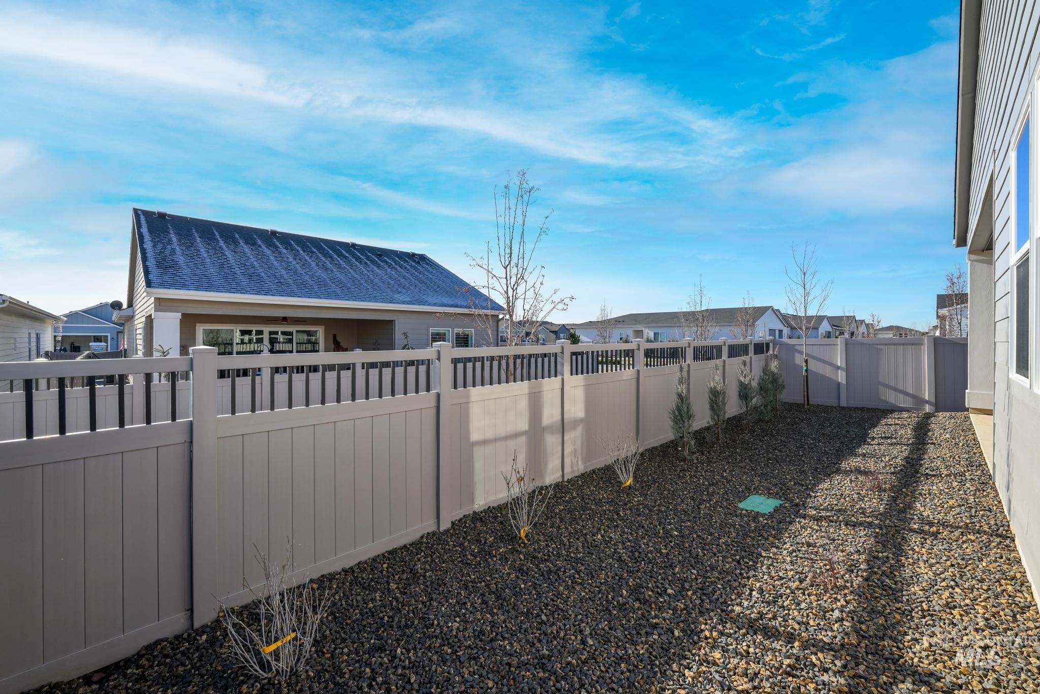 8629 West Stillmore Street Star, ID 83669 - Photo 27 of 27 Fenced backyard with a residential view