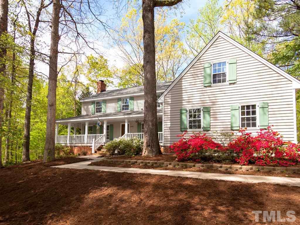 4909 Connell Drive Raleigh, NC 27612 - Photo 1 of 25 a front view of a house with a yard