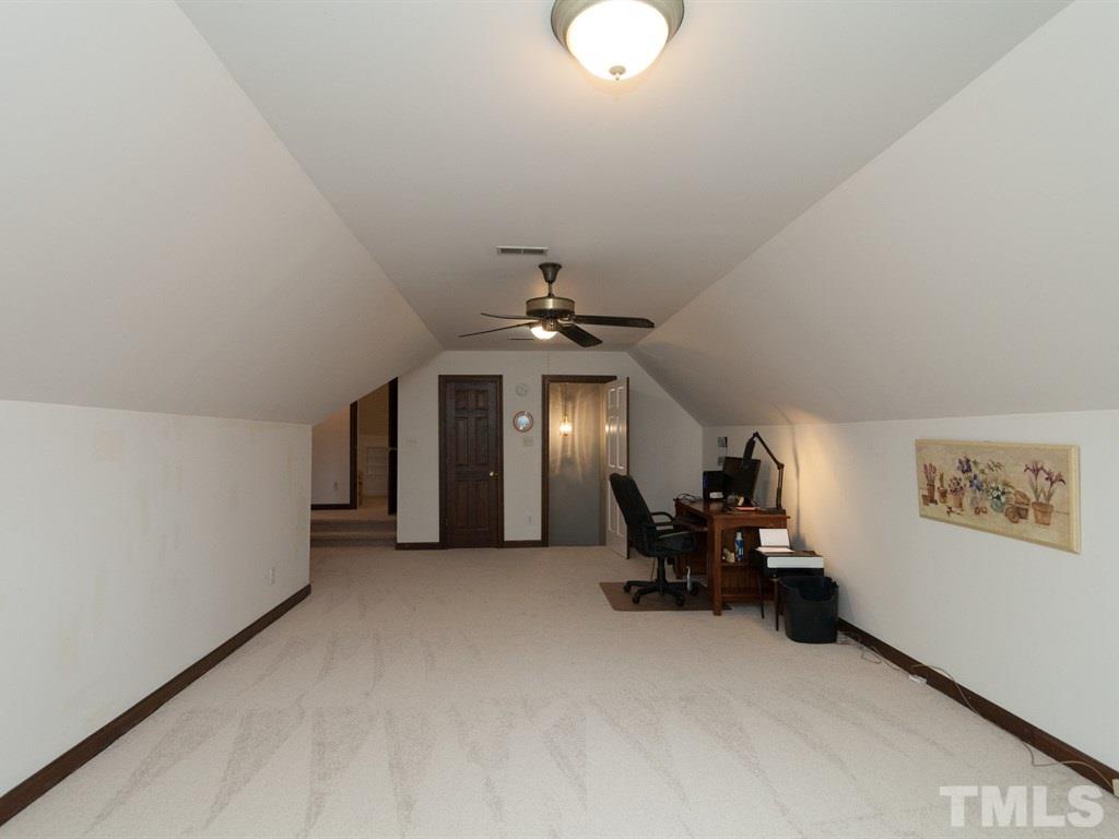 4909 Connell Drive Raleigh, NC 27612 - Photo 22 of 25 a view of a livingroom with furniture