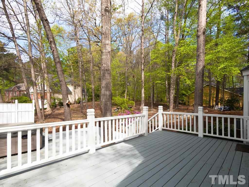 4909 Connell Drive Raleigh, NC 27612 - Photo 23 of 25 a view of a wooden deck