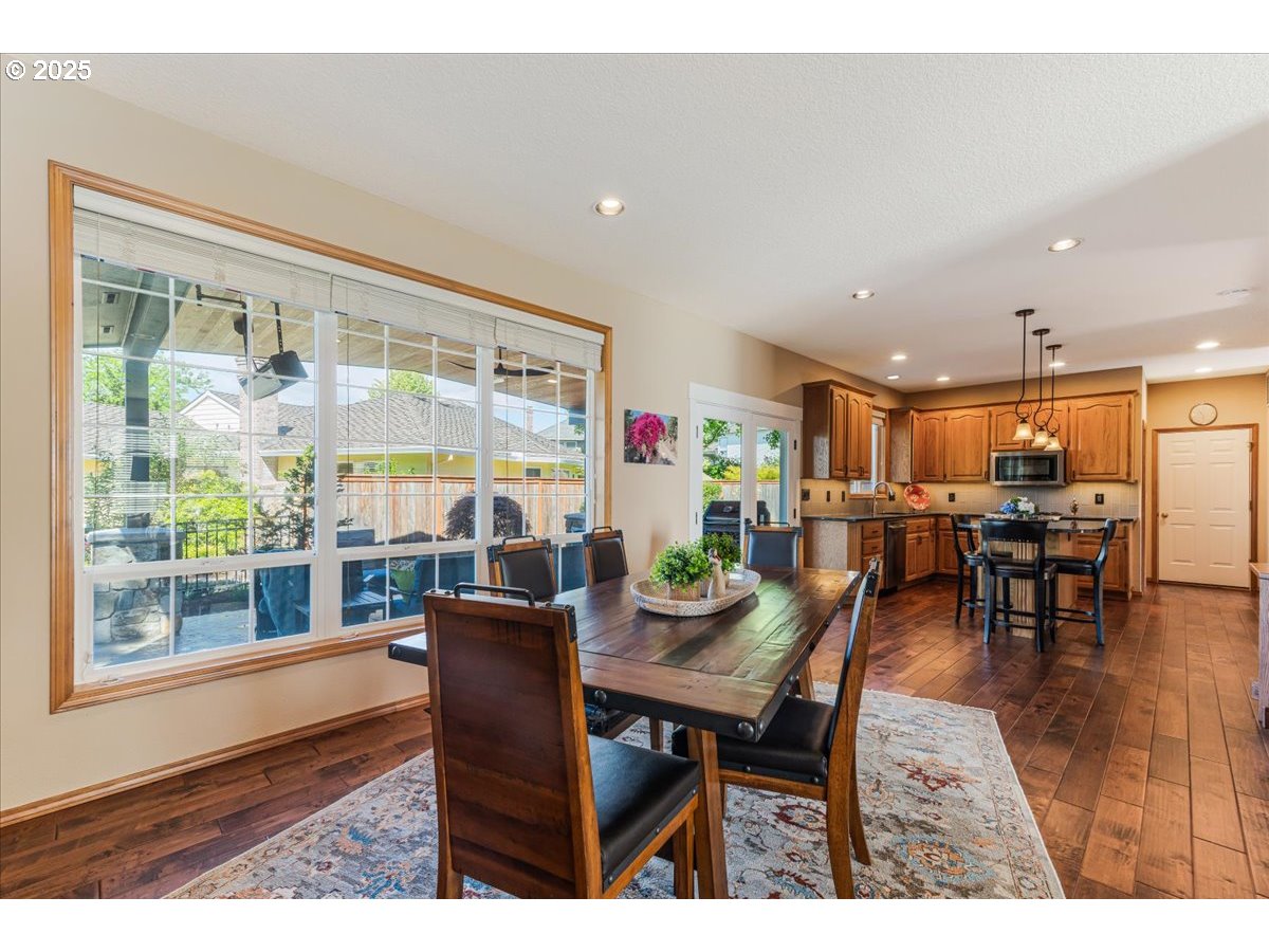 16706 Northwest Waterford Way Portland, OR 97229 - Photo 12 of 45 a dining room with furniture and window