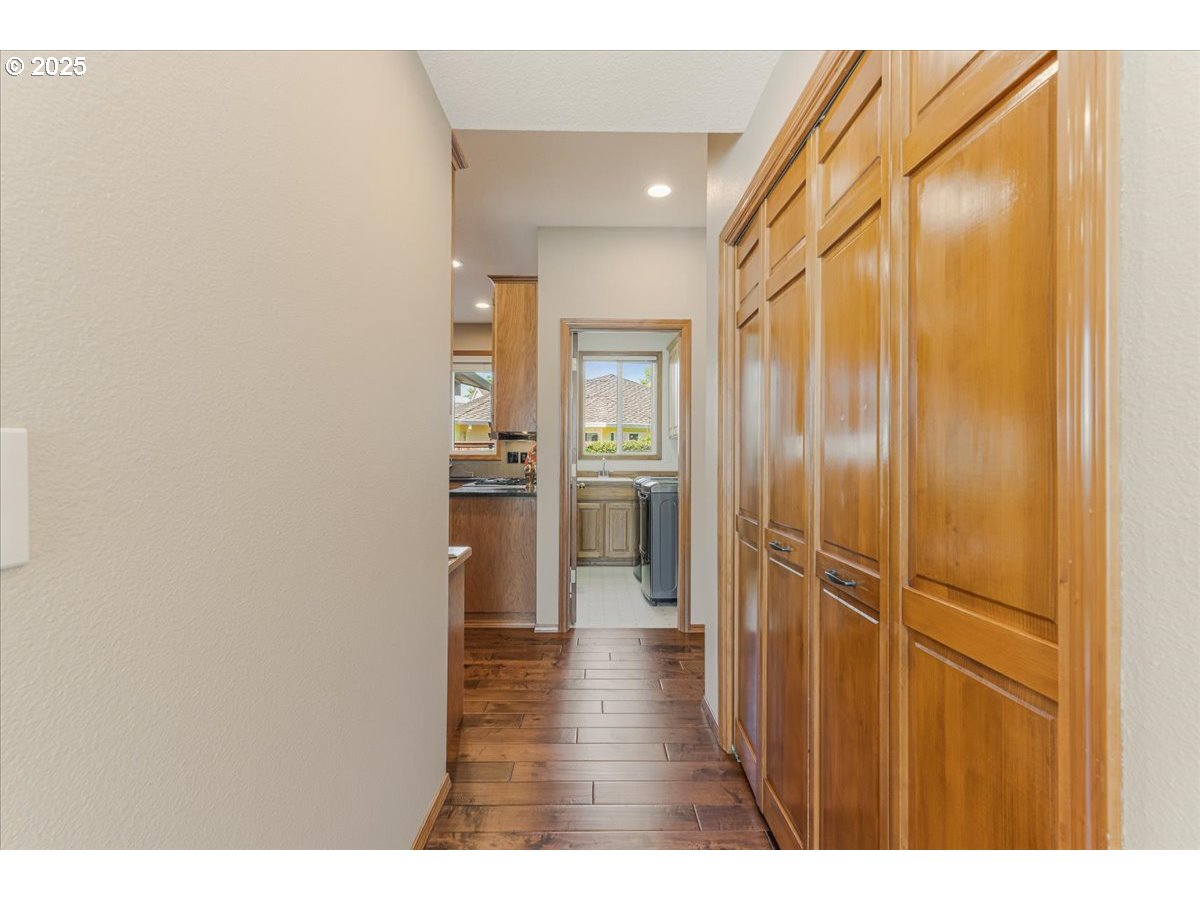 16706 Northwest Waterford Way Portland, OR 97229 - Photo 20 of 45 a view of a hallway with wooden floor