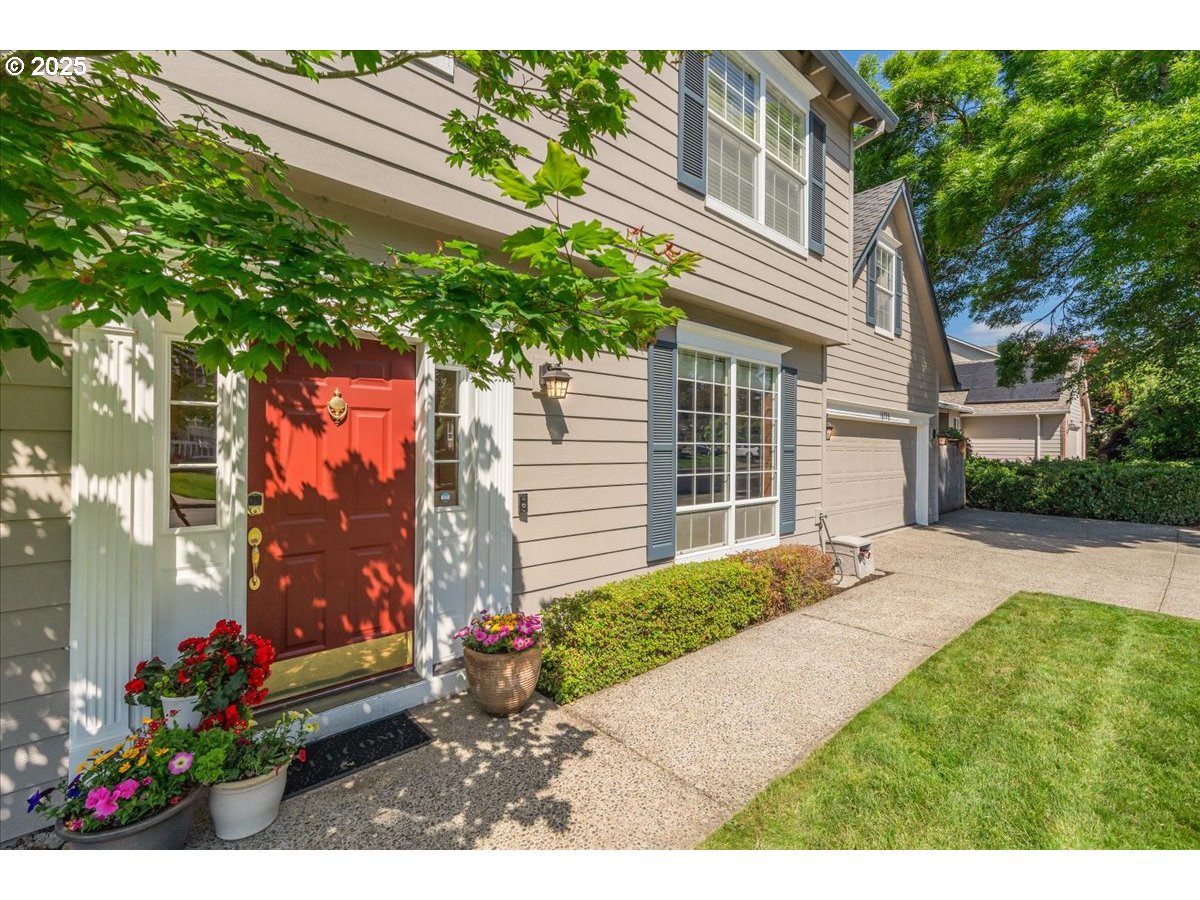 16706 Northwest Waterford Way Portland, OR 97229 - Photo 3 of 45 a view of a house with a backyard