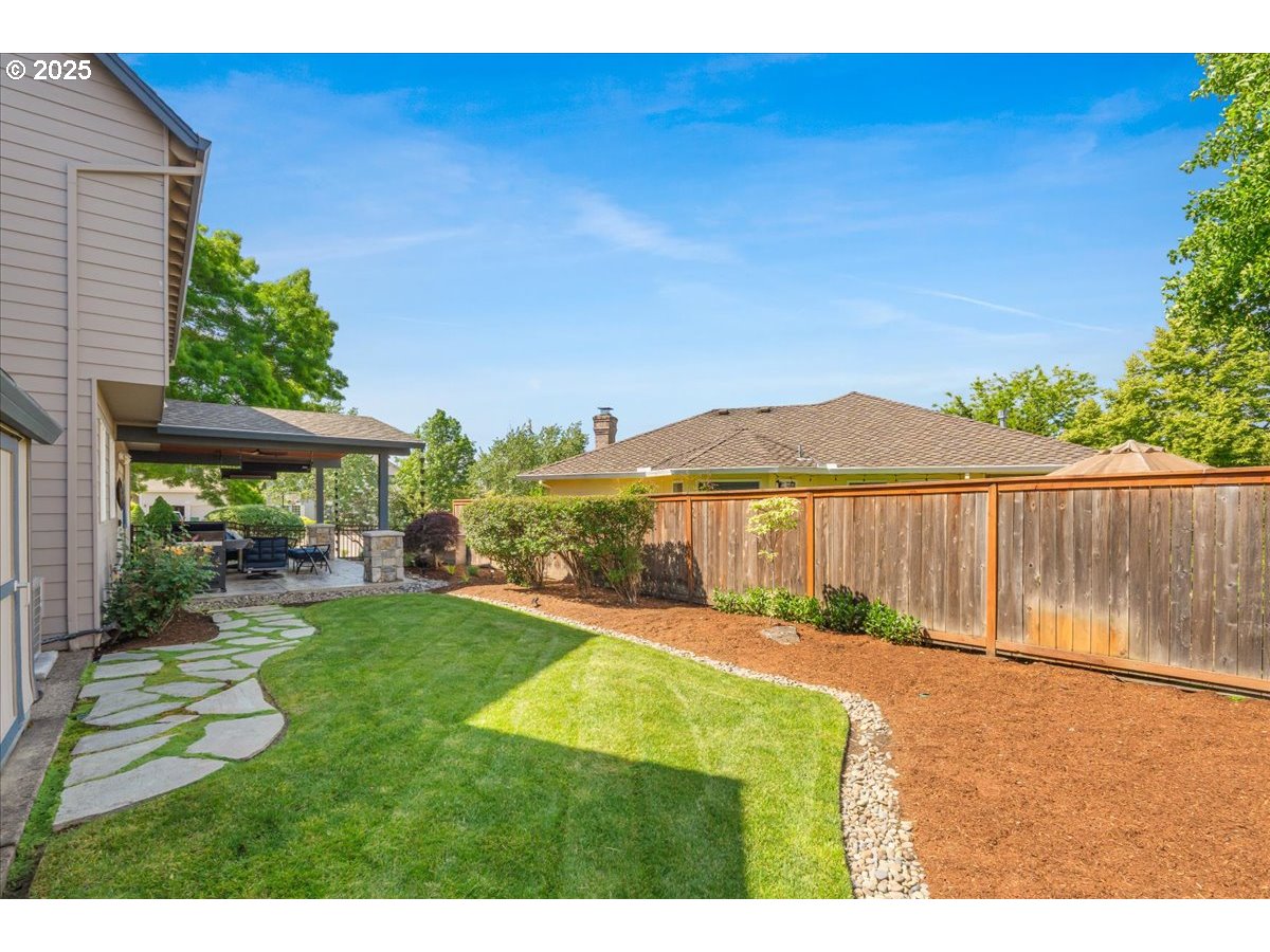 16706 Northwest Waterford Way Portland, OR 97229 - Photo 41 of 45 a view of swimming pool with a yard and outdoor seating