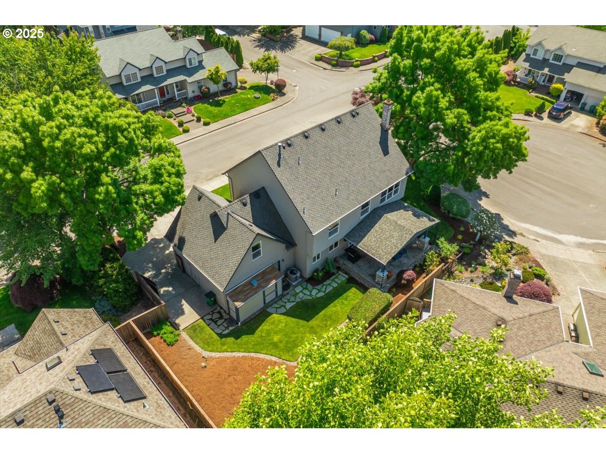 16706 Northwest Waterford Way Portland, OR 97229 - Photo 45 of 45 an aerial view of a house with a yard