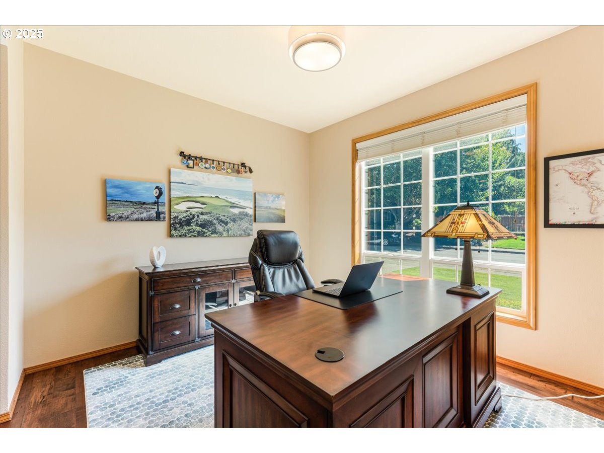 16706 Northwest Waterford Way Portland, OR 97229 - Photo 5 of 45 a view of a workspace with furniture