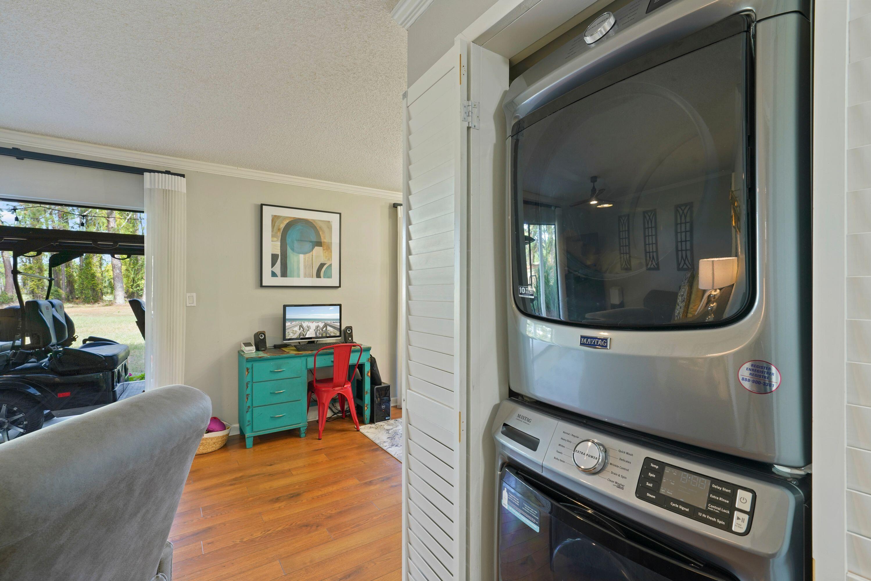 283 Sunset Bay, Unit 28B Miramar Beach, FL 32550 - Photo 16 of 23 a living room with furniture and a fireplace