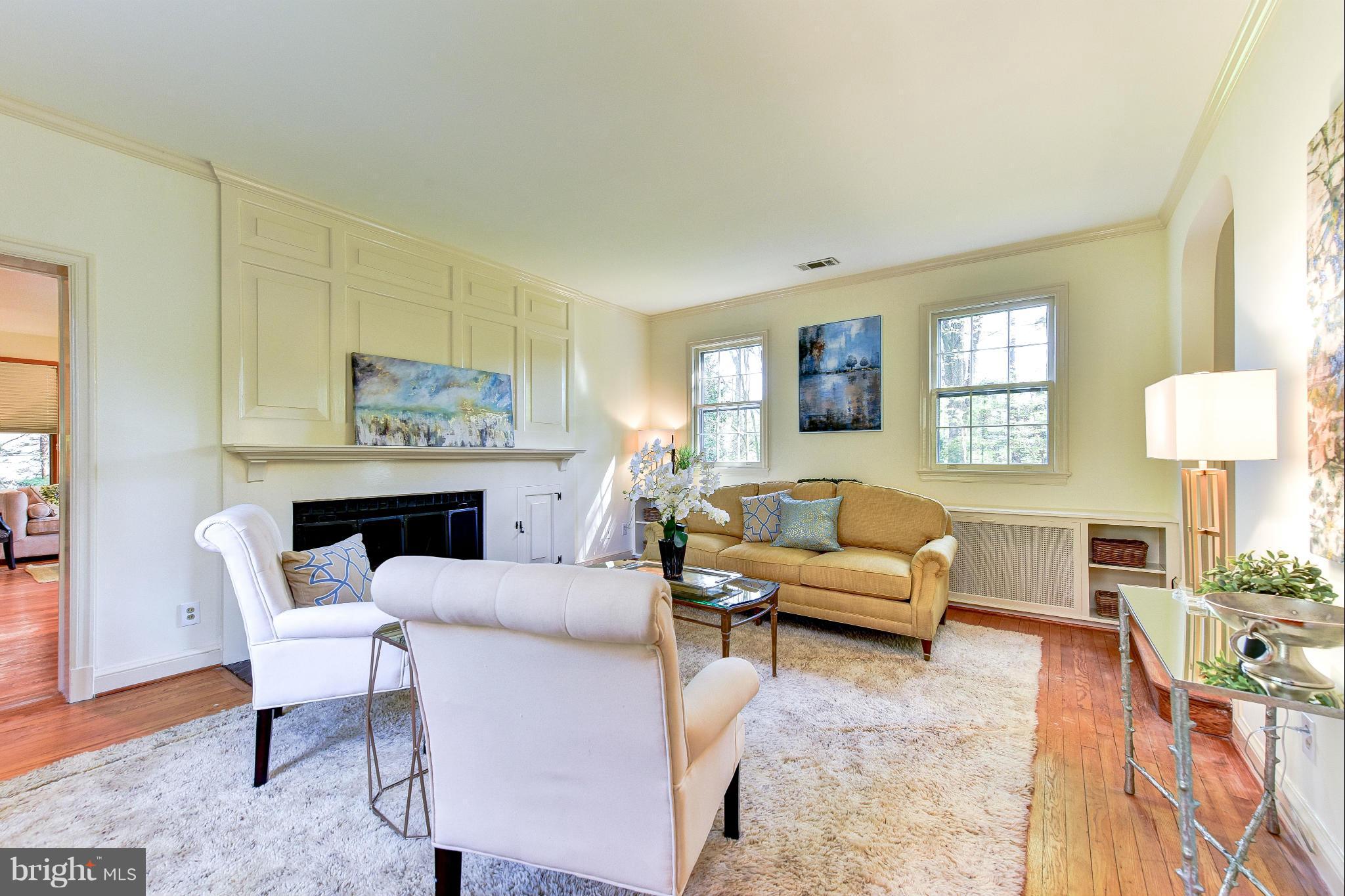 4108 Dresden Street Kensington, MD 20895 - Photo 2 of 24 a living room with furniture and a table