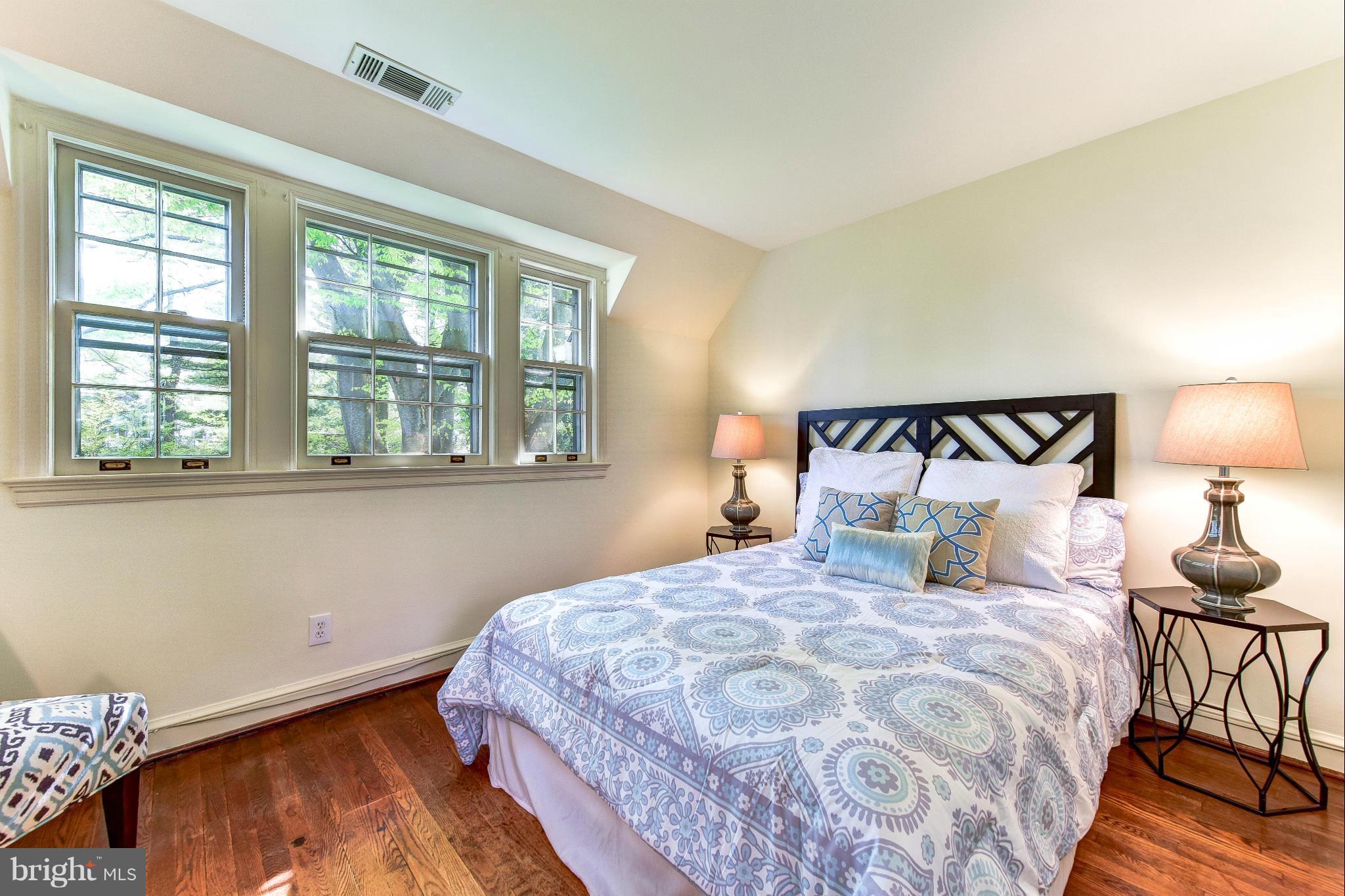 4108 Dresden Street Kensington, MD 20895 - Photo 18 of 24 a bedroom with a bed and a window