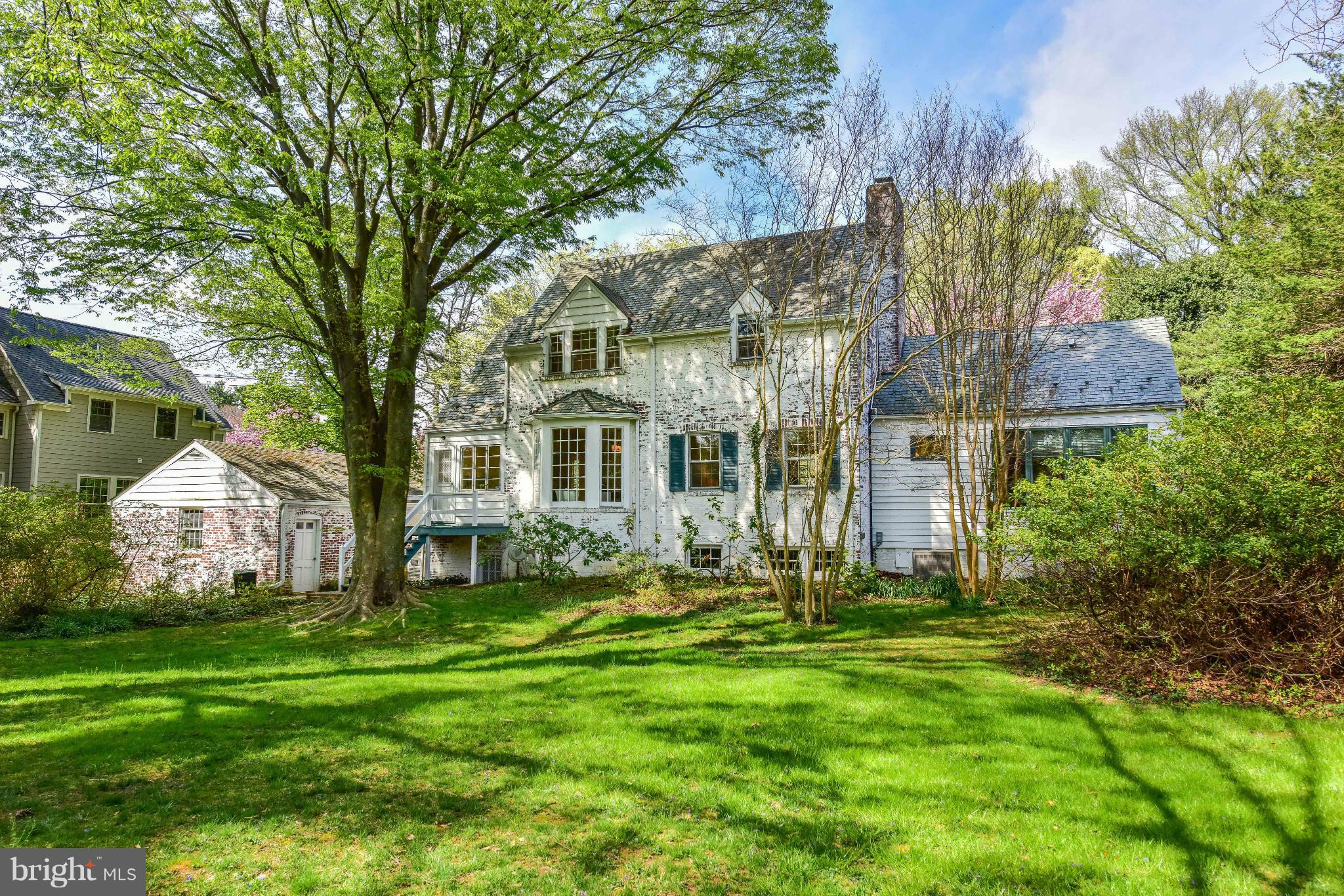 4108 Dresden Street Kensington, MD 20895 - Photo 23 of 24 a front view of a house with garden