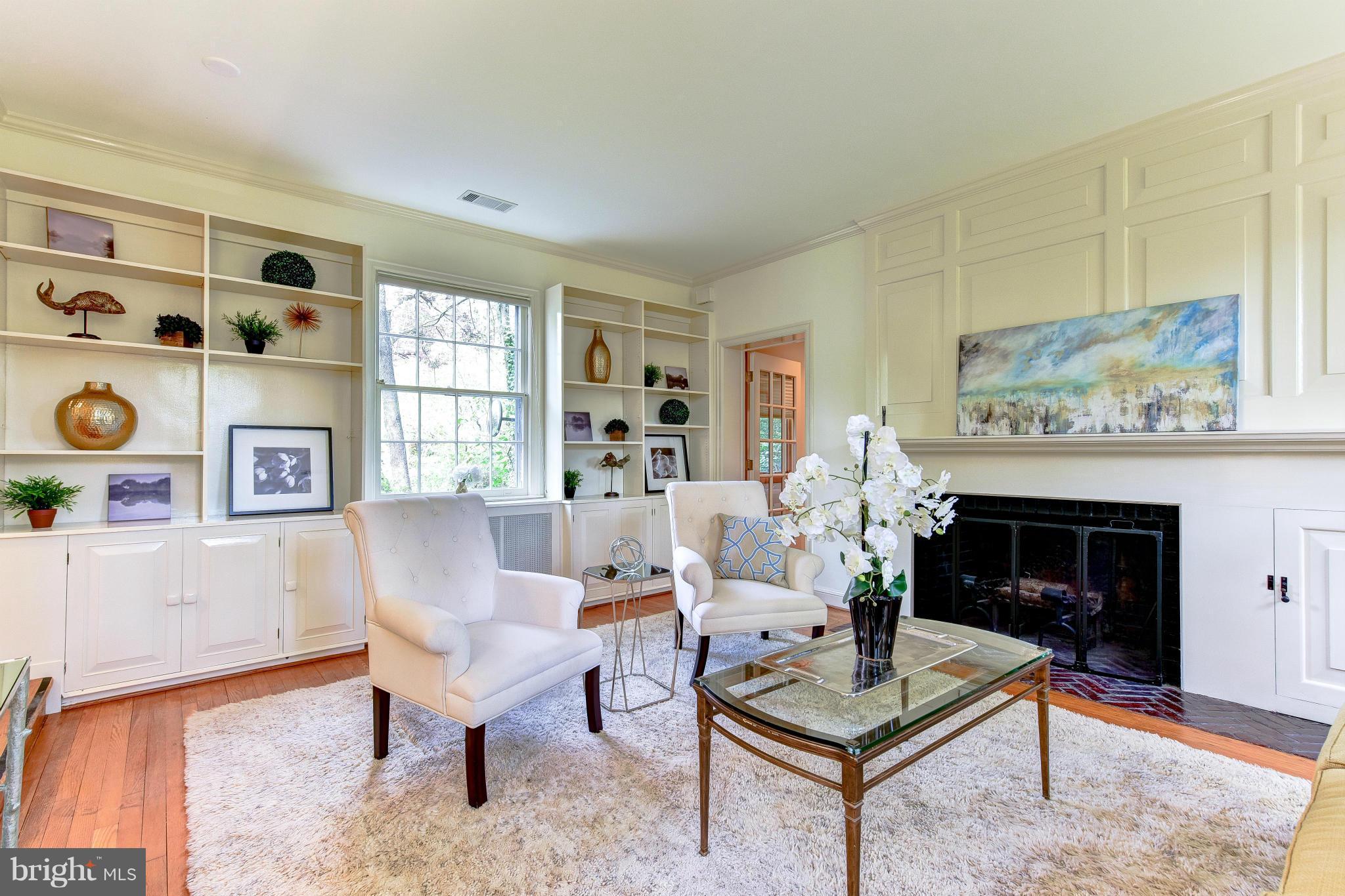 4108 Dresden Street Kensington, MD 20895 - Photo 4 of 24 a living room with furniture and a fireplace