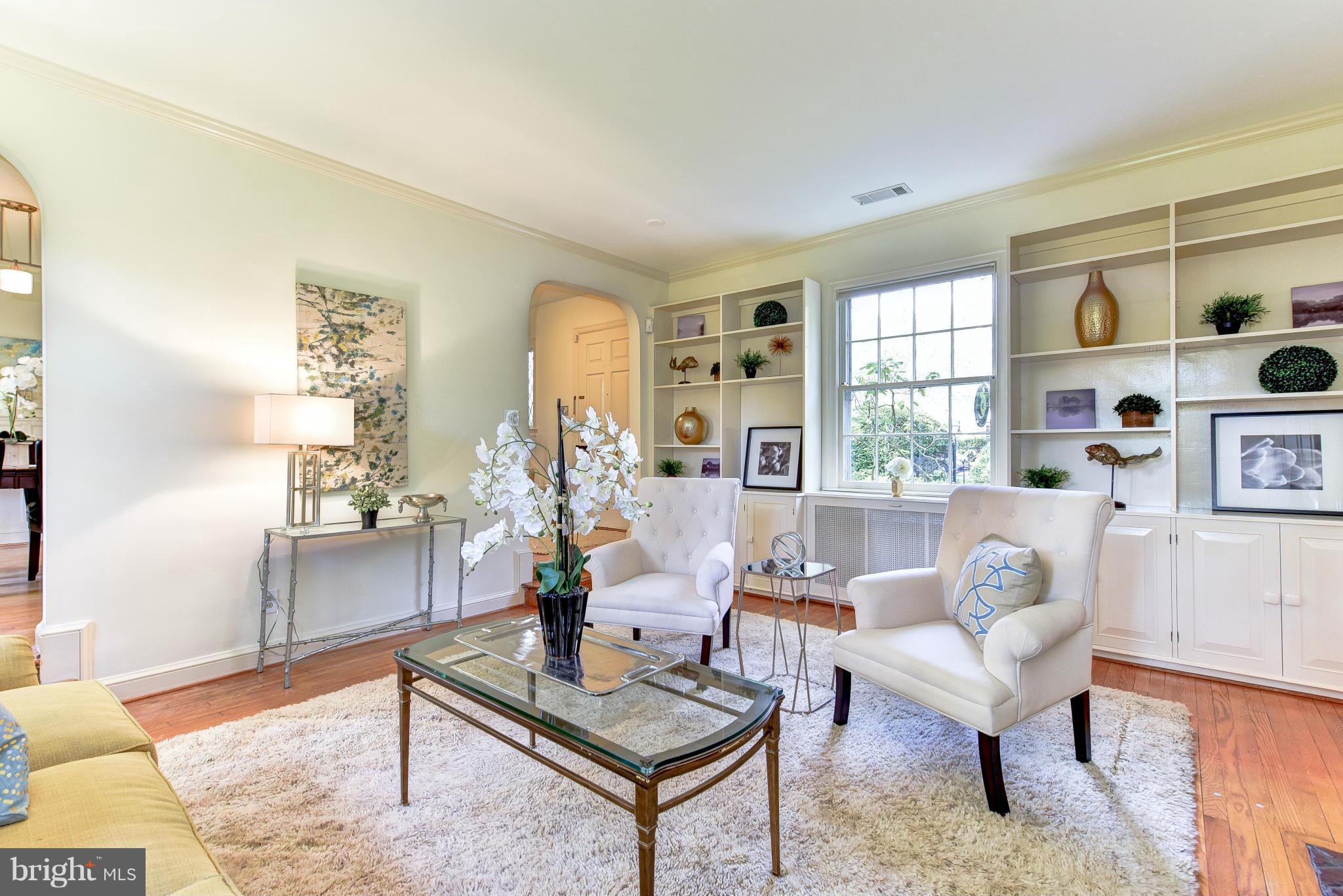 4108 Dresden Street Kensington, MD 20895 - Photo 5 of 24 a living room with furniture a rug and a window