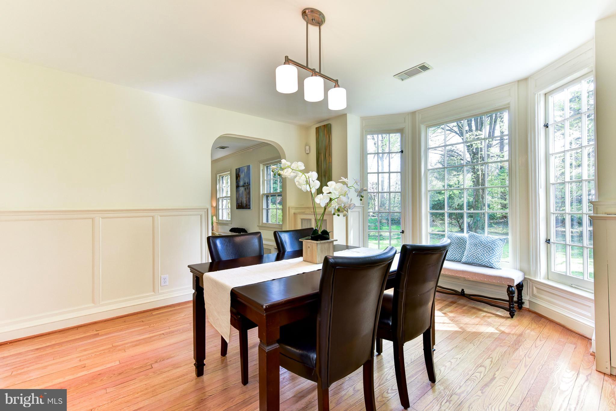 4108 Dresden Street Kensington, MD 20895 - Photo 9 of 24 a view of a dining room with furniture window and wooden floor