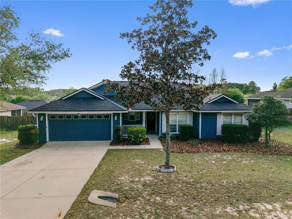 front view of a house with a yard