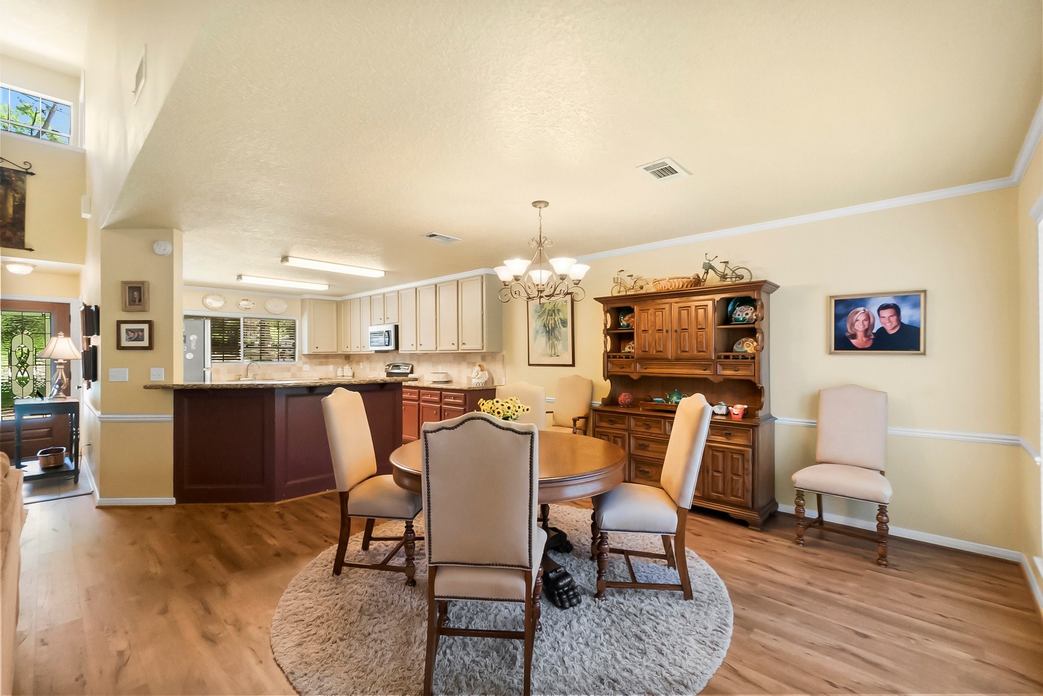 292 Apple Valley Drive Conroe, TX 77304 - Photo 18 of 40 a dining room with furniture and wooden floor