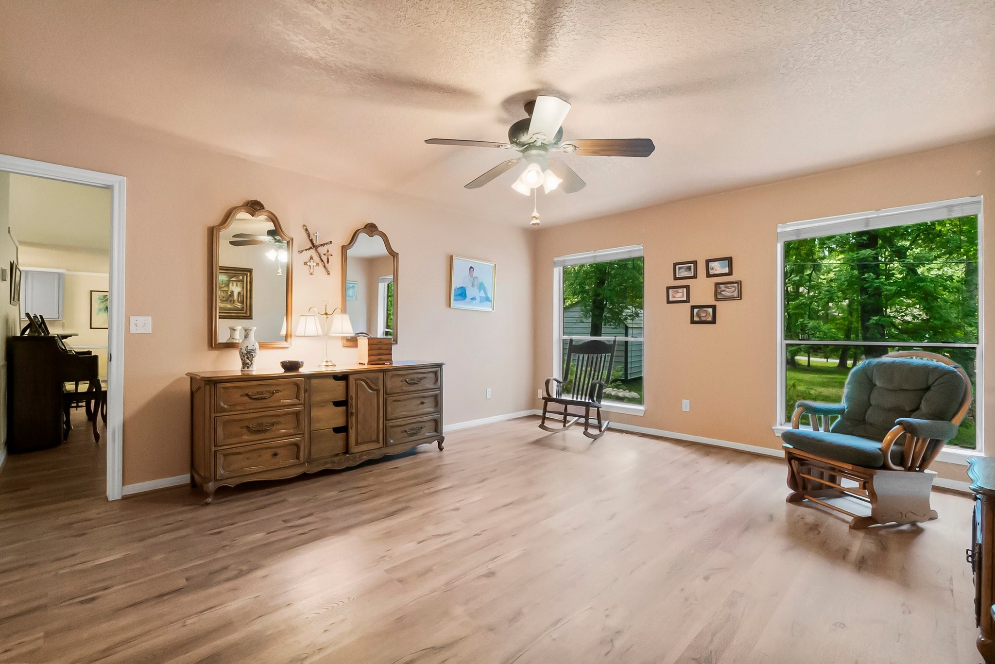 292 Apple Valley Drive Conroe, TX 77304 - Photo 19 of 40 a living room with furniture and a large window