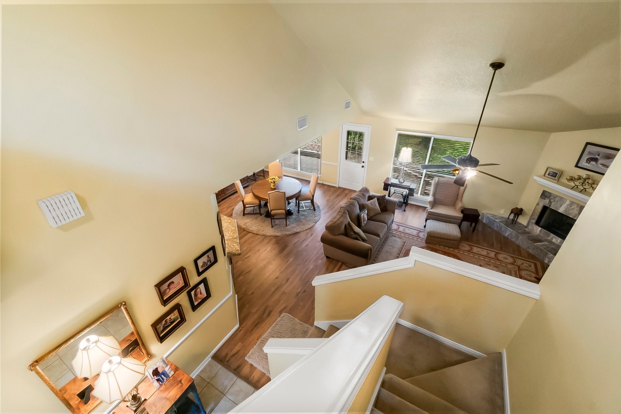 292 Apple Valley Drive Conroe, TX 77304 - Photo 26 of 40 a living room with furniture a rug and a flat screen tv
