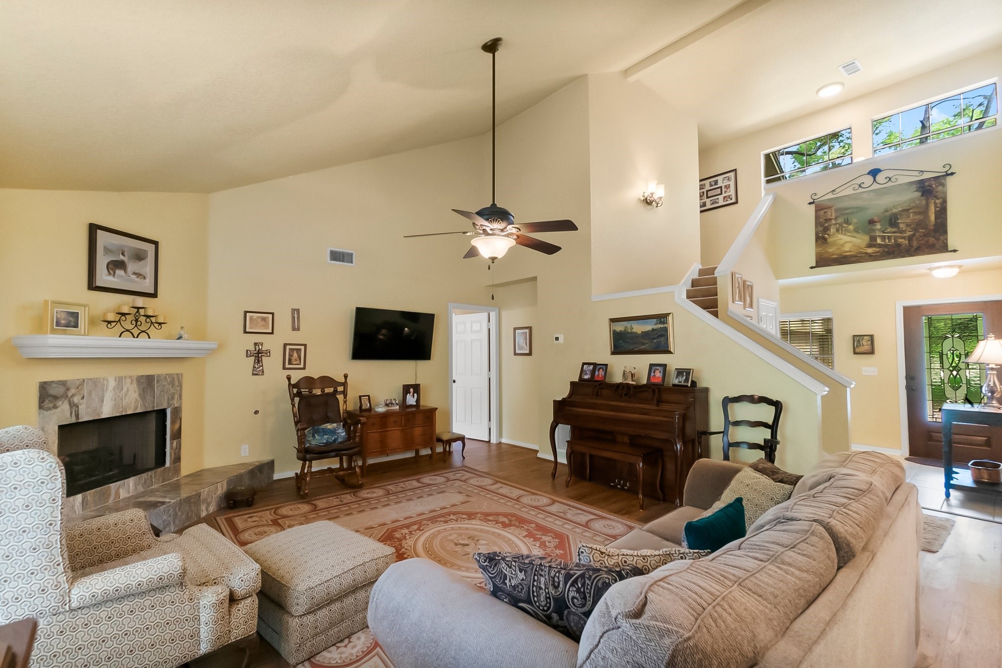 292 Apple Valley Drive Conroe, TX 77304 - Photo 7 of 40 a living room with furniture fireplace and a flat screen tv