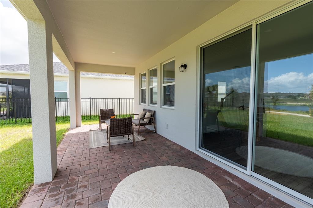 2069 Valencia Blossom Street Clermont, FL 34711 - Photo 23 of 24 a living room with furniture