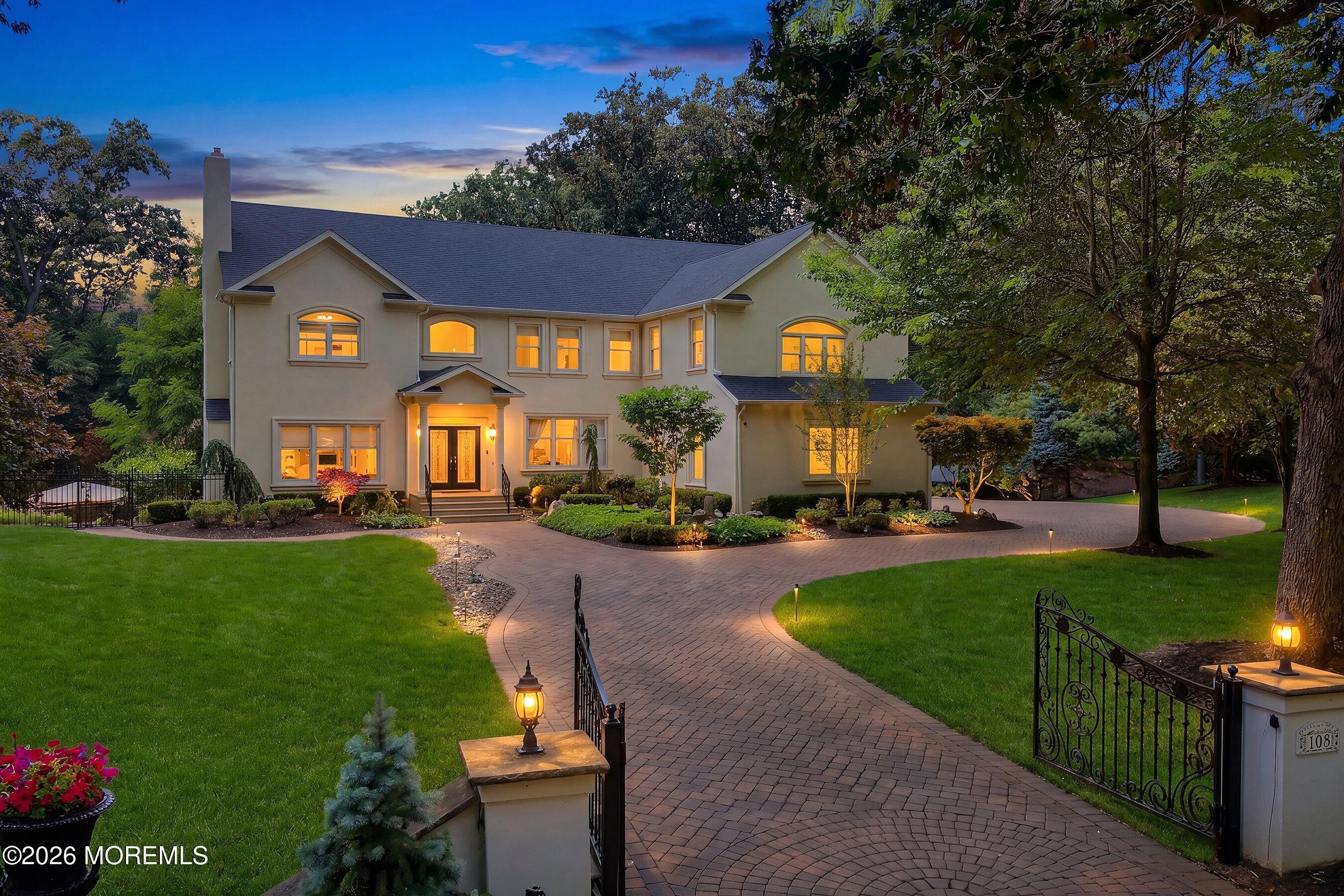 108 Heulitt Road Colts Neck, NJ 07722 - Photo 3 of 50 08-Front Left 3 Twilight
