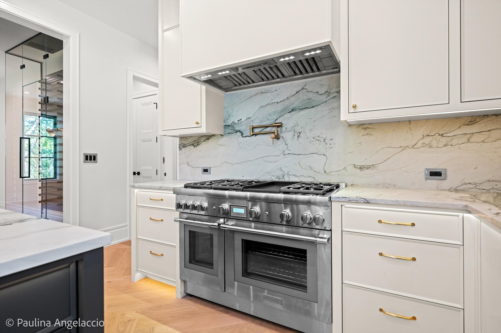 699 Plum Tree Road Barrington Hills, IL 60010 - Photo 21 of 84 a kitchen with stainless steel appliances granite countertop a stove and a sink