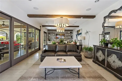 a living room with furniture and a couch