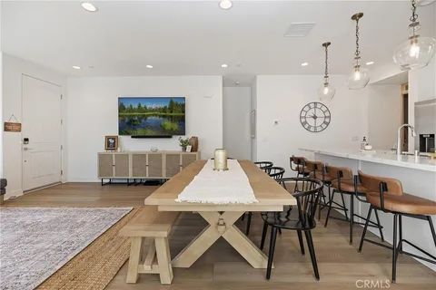 a very nice looking dining room with a table and chairs