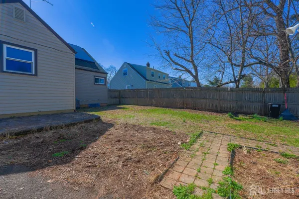 a view of a back yard of the house