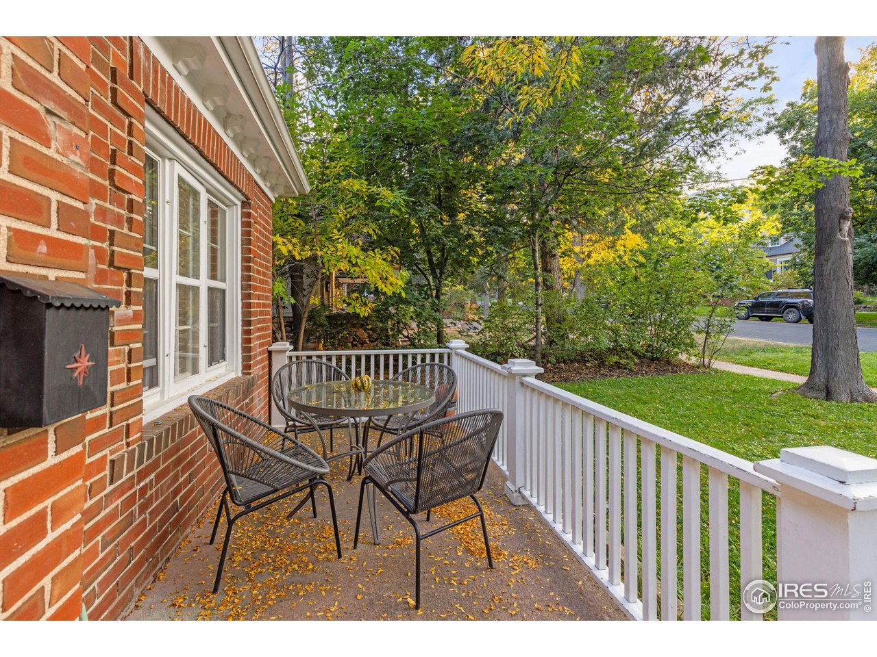 830 15th Street Boulder, CO 80302 - Photo 3 of 40 a view of a chair and tables in the patio