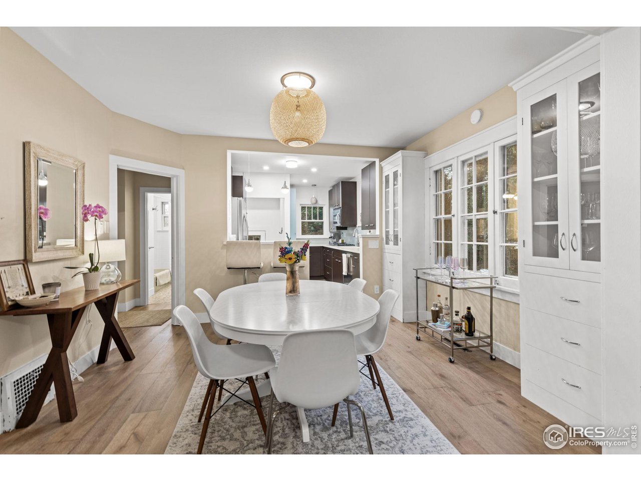 830 15th Street Boulder, CO 80302 - Photo 9 of 40 a view of a dining room with furniture and wooden floor