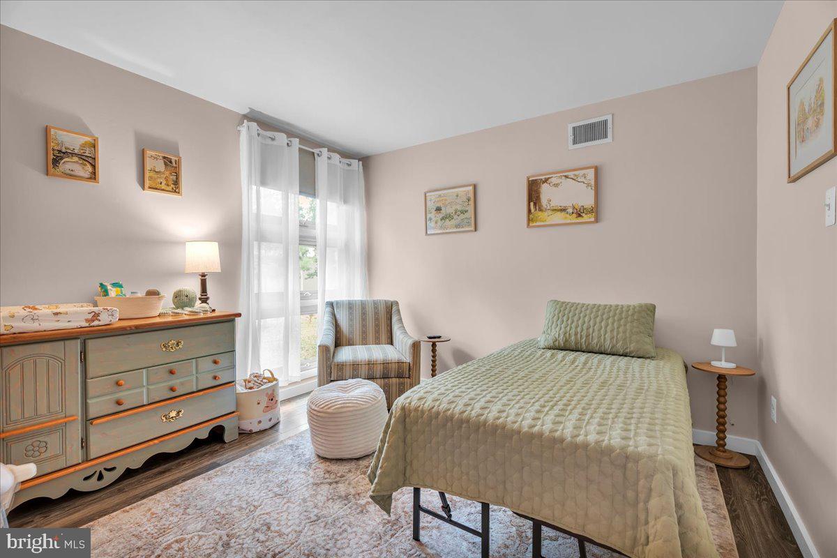 64 Blue Anchor Road Sicklerville, NJ 08081 - Photo 25 of 47 a bedroom with a bed and a window