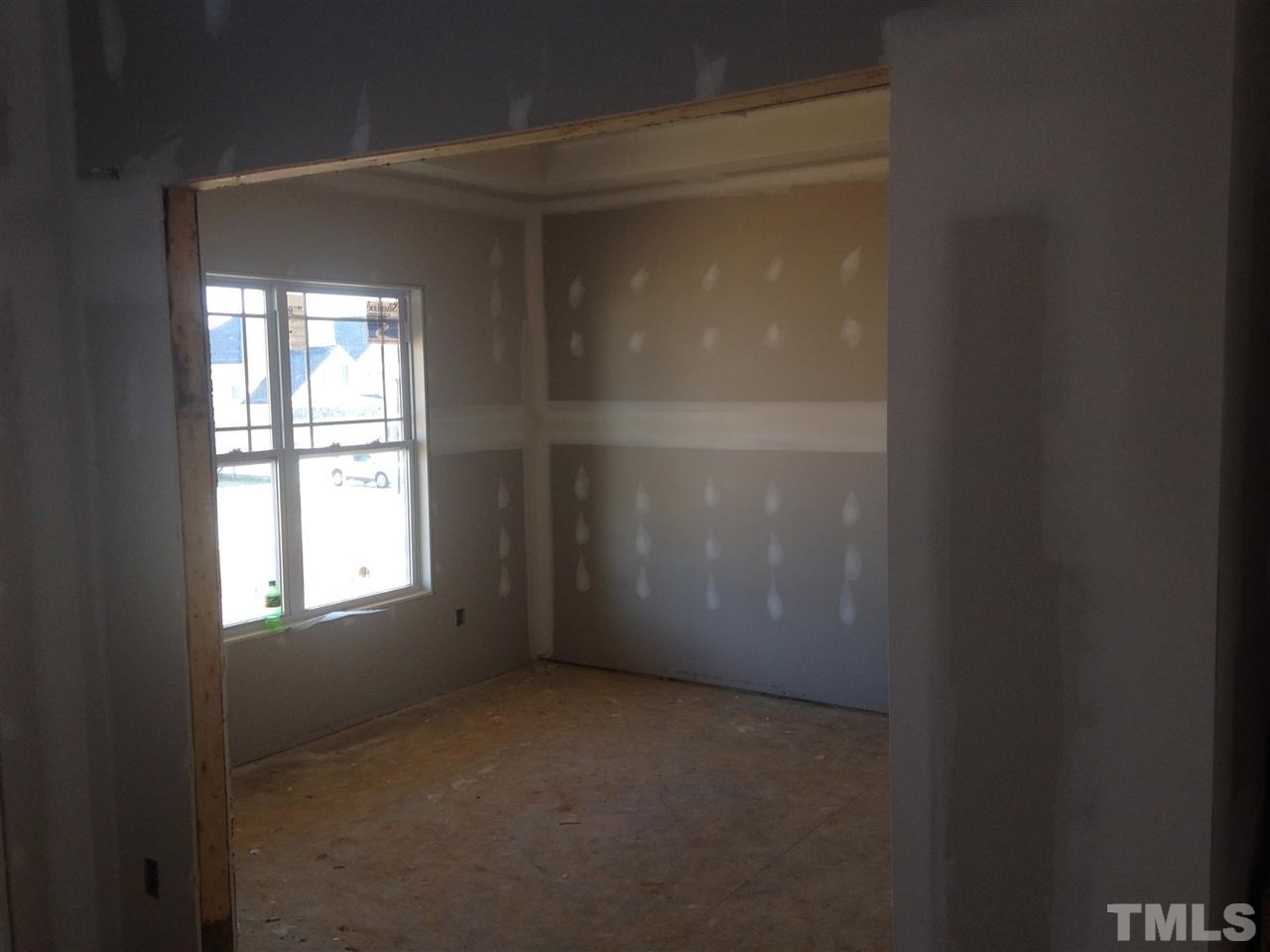50 South Sunset Ridge Drive Willow Spring, NC 27592 - Photo 2 of 5 a view of empty room with window