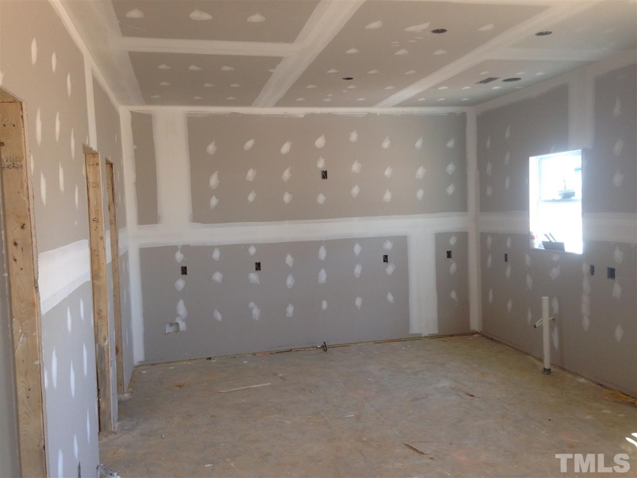 50 South Sunset Ridge Drive Willow Spring, NC 27592 - Photo 4 of 5 a view of an empty room