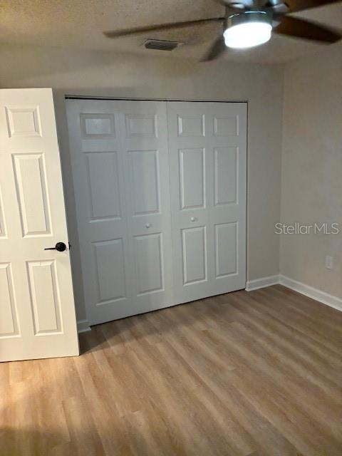 134 East Kicklighter Road Lake Helen, FL 32744 - Photo 11 of 15 a view of room with wooden floor