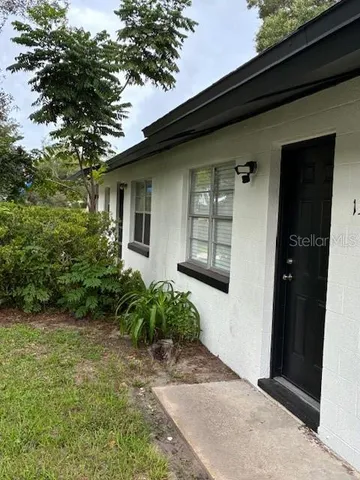 a front view of a house having yard