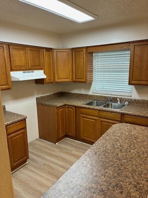 134 East Kicklighter Road Lake Helen, FL 32744 - Photo 7 of 15 a kitchen with stainless steel appliances granite countertop a stove a sink and a microwave