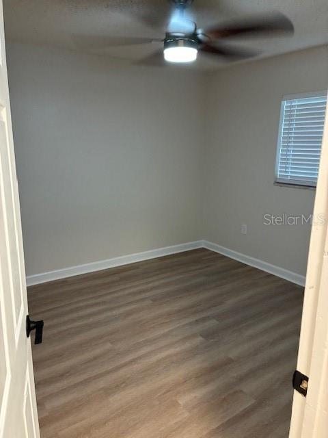 134 East Kicklighter Road Lake Helen, FL 32744 - Photo 10 of 15 a view of a small space with wooden floor and a window