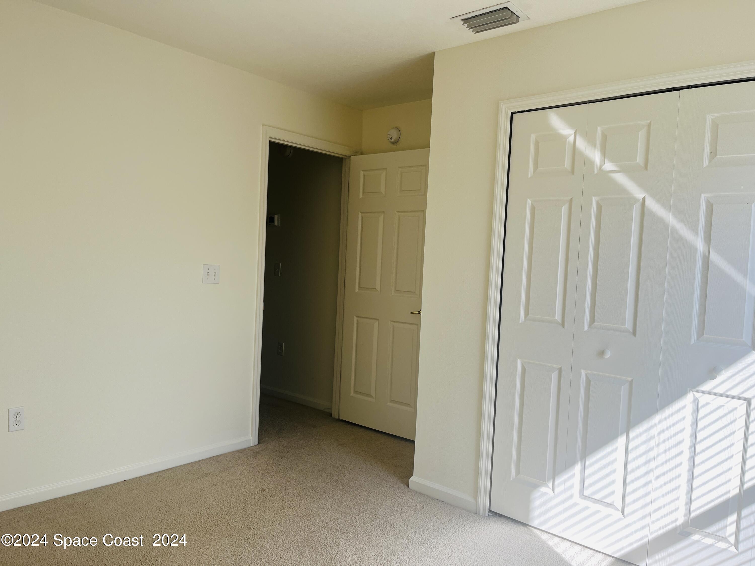 4006 Meander Place, Unit 201 Rockledge, FL 32955 - Photo 13 of 20 a view of an empty room