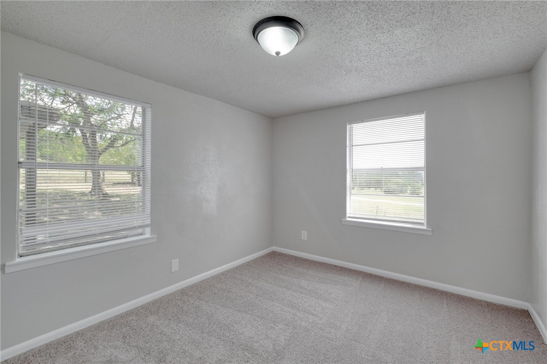 4978 Sparta Road Belton, TX 76513 - Photo 16 of 32 an empty room with a window