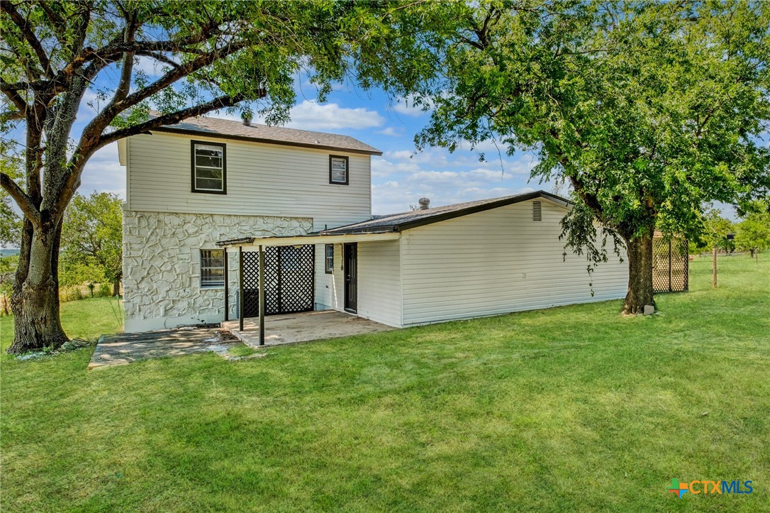4978 Sparta Road Belton, TX 76513 - Photo 23 of 32 a view of a backyard with a tree