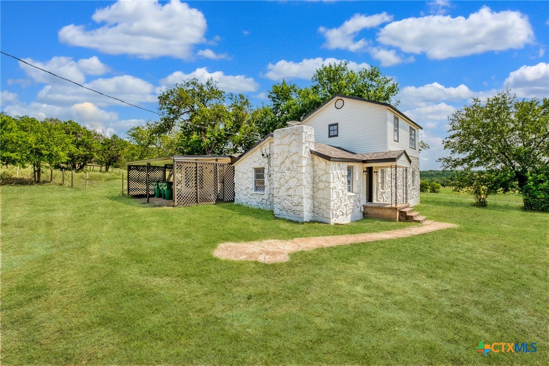4978 Sparta Road Belton, TX 76513 - Photo 5 of 32 a aerial view of a house with a yard and garage