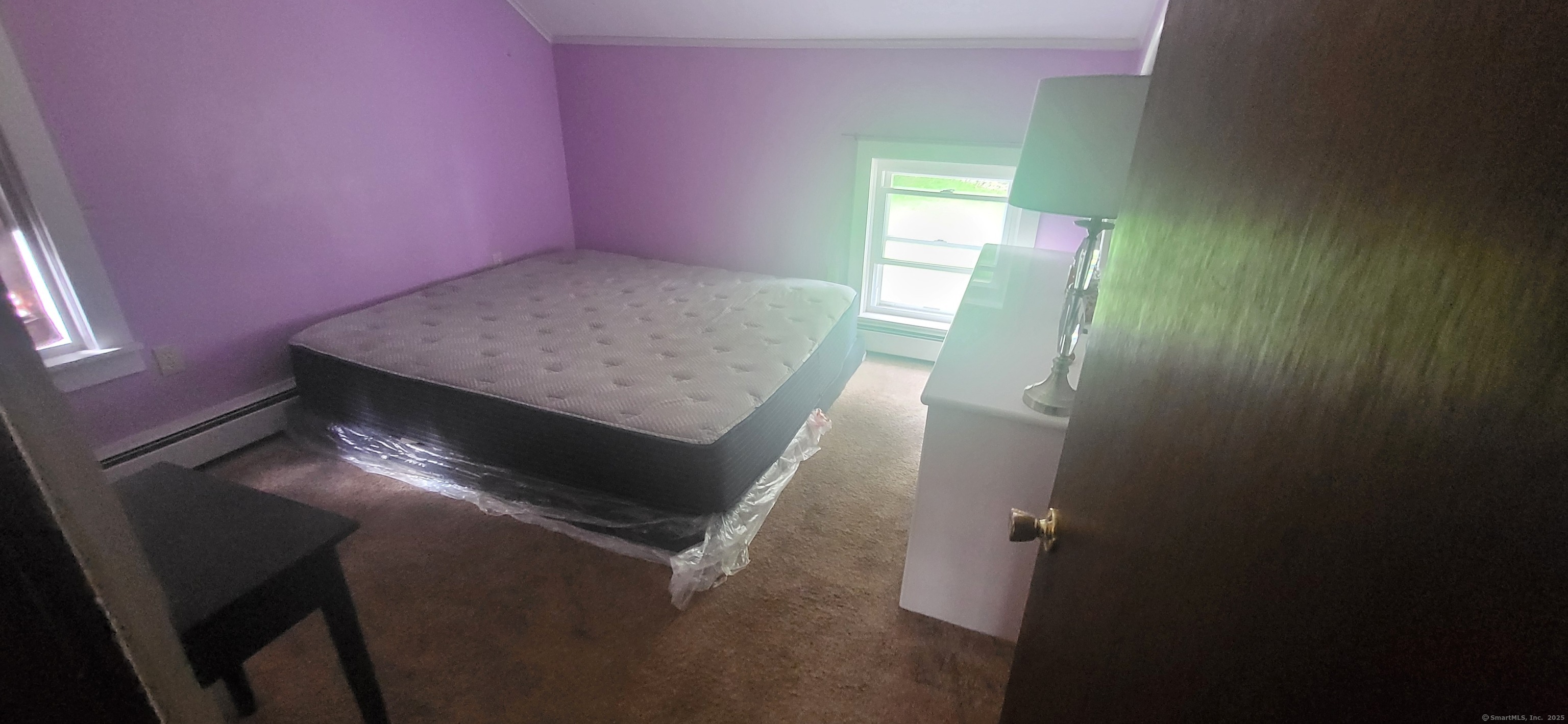 179 High Street Sprague, CT 06330 - Photo 5 of 9 a view of an empty room and window