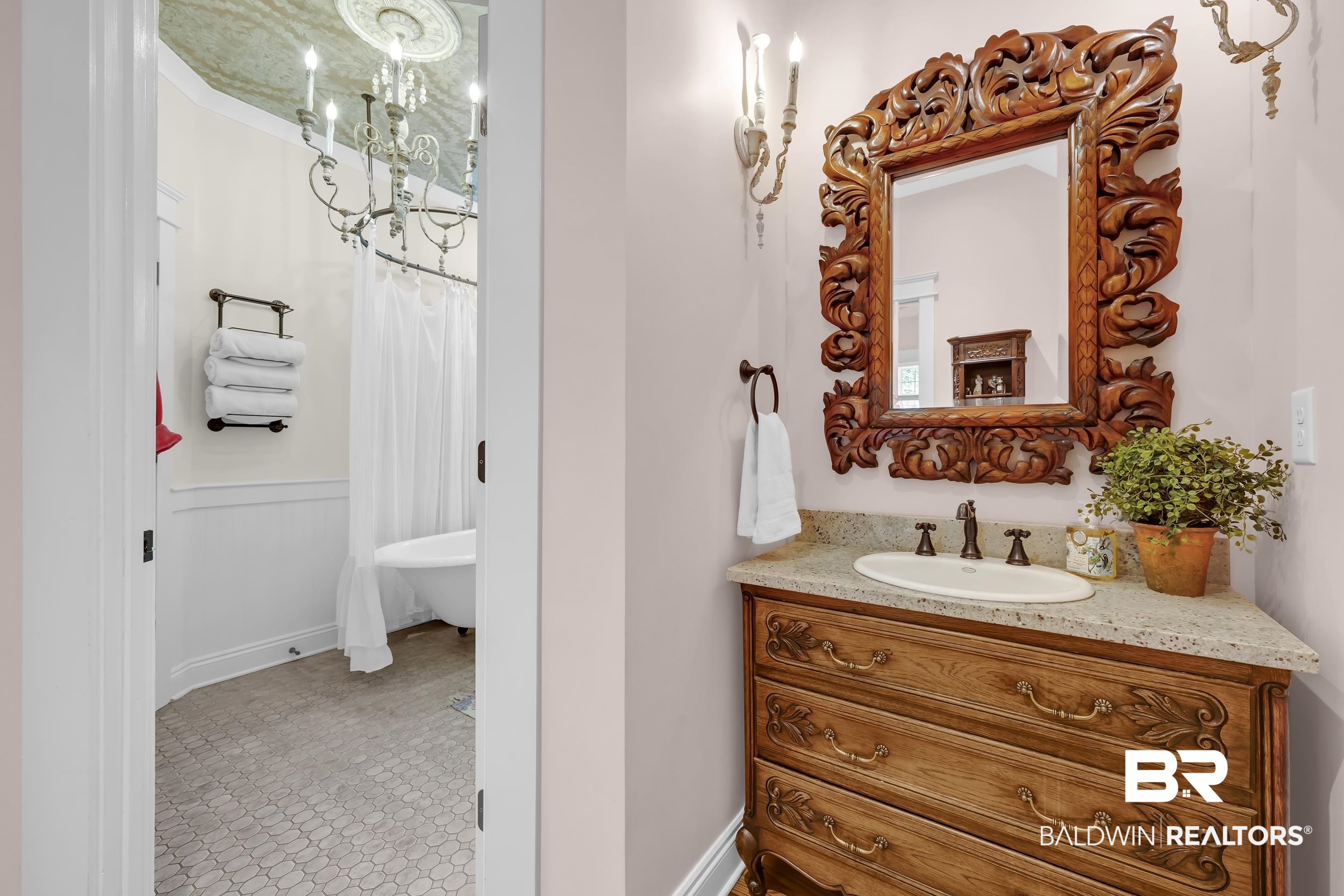 12161 Jessamine Street Magnolia Springs, AL 36555 - Photo 36 of 70 Bathroom with vanity, a soaking tub, and a shower with curtain