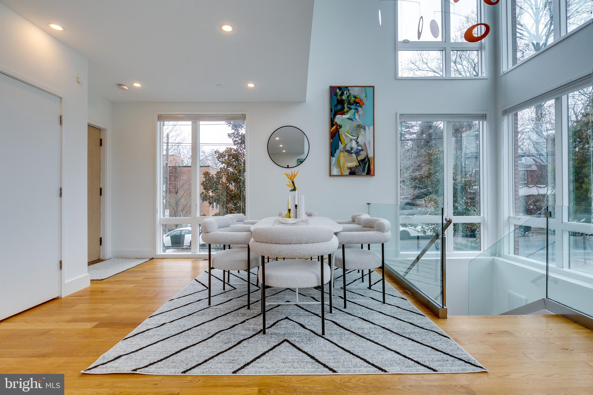 4529 MacArthur Boulevard Northwest, Unit 3 Washington, DC 20007 - Photo 11 of 50 a view of a dining room with furniture window and wooden floor