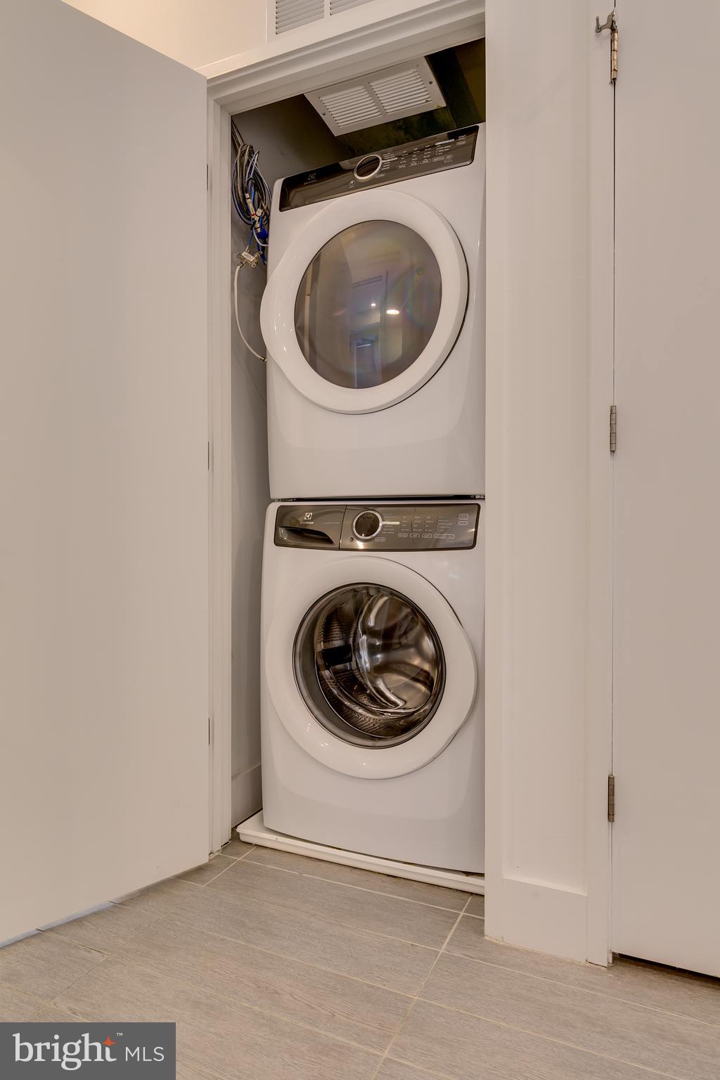 4529 MacArthur Boulevard Northwest, Unit 3 Washington, DC 20007 - Photo 39 of 50 a utility room with dryer and washer